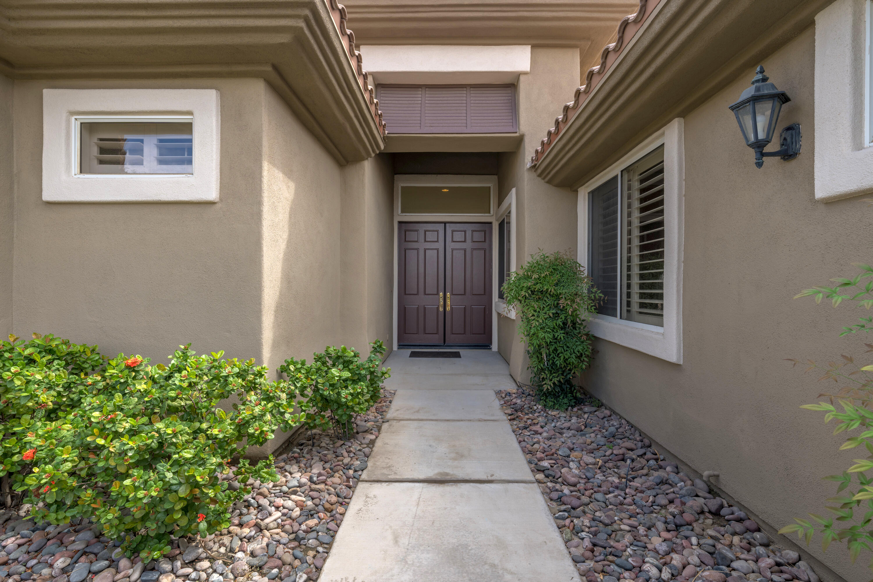 35260 Monarch Way Palm Desert, CA 92211 - Photo 8 of 44 a view of a pathway of the house