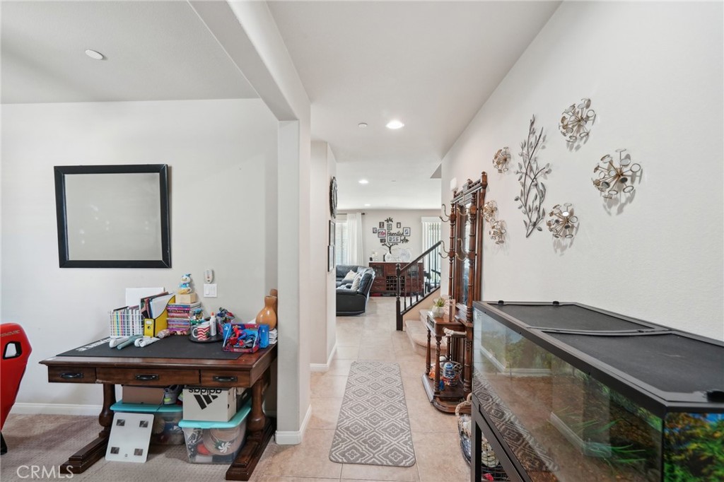 29259 Bouris Drive Menifee, CA 92584 - Photo 16 of 56 a room with furniture and gym equipment