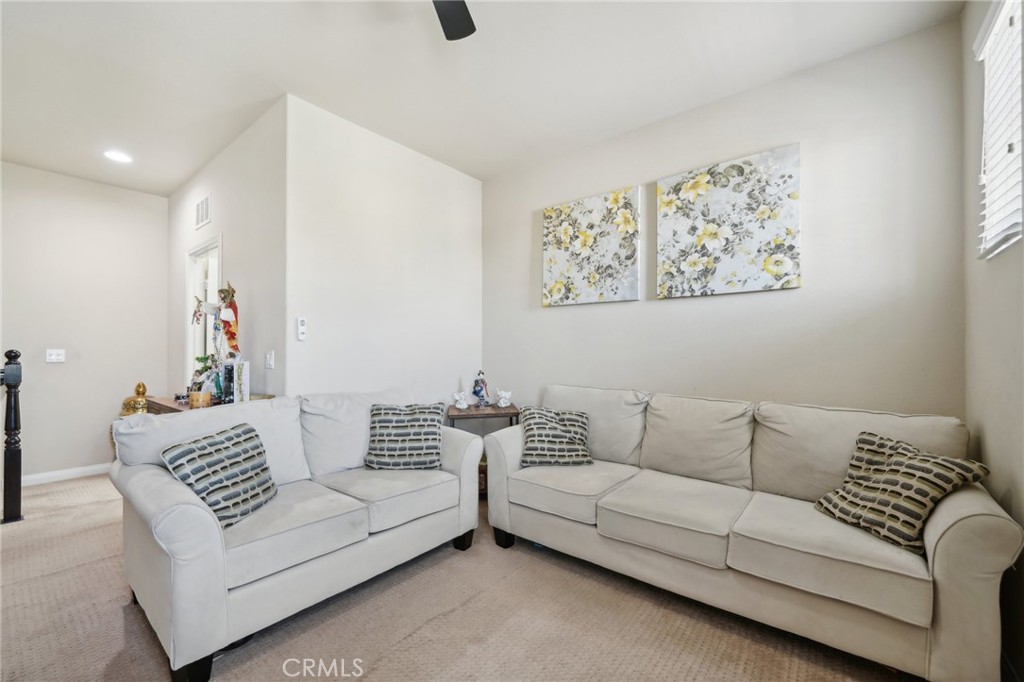 29259 Bouris Drive Menifee, CA 92584 - Photo 20 of 56 a living room with furniture and a couch