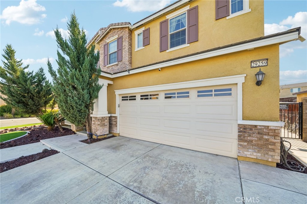 29259 Bouris Drive Menifee, CA 92584 - Photo 3 of 56 a view of a front of house with a street