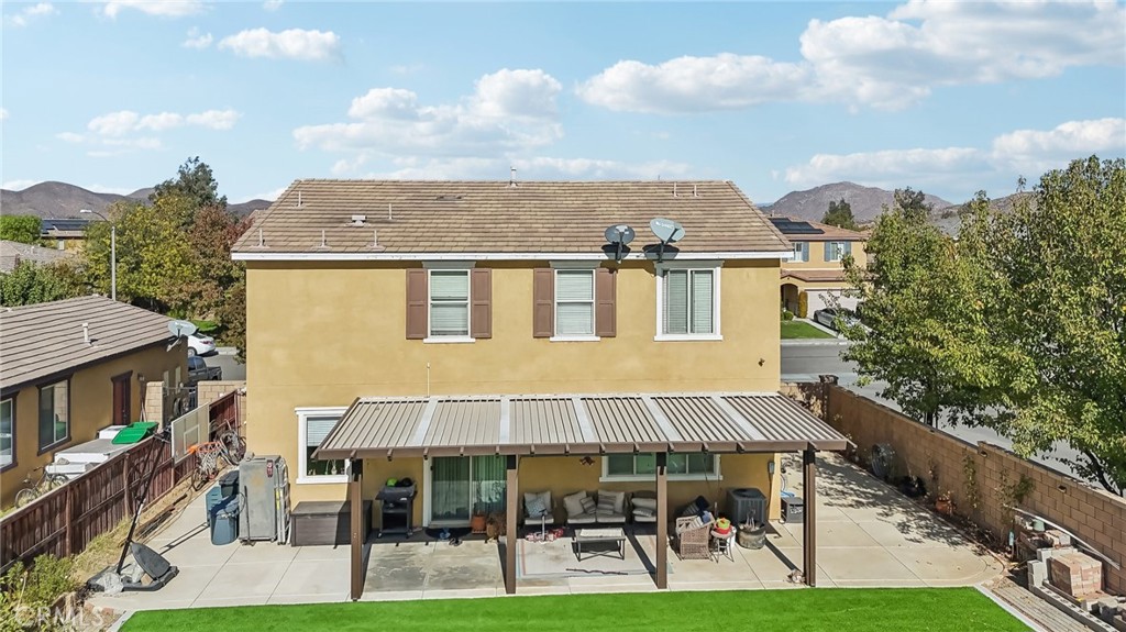 29259 Bouris Drive Menifee, CA 92584 - Photo 43 of 56 a aerial view of a house with table and chairs