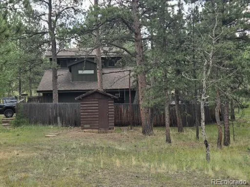 a view of wooden floor and windows in an empty room