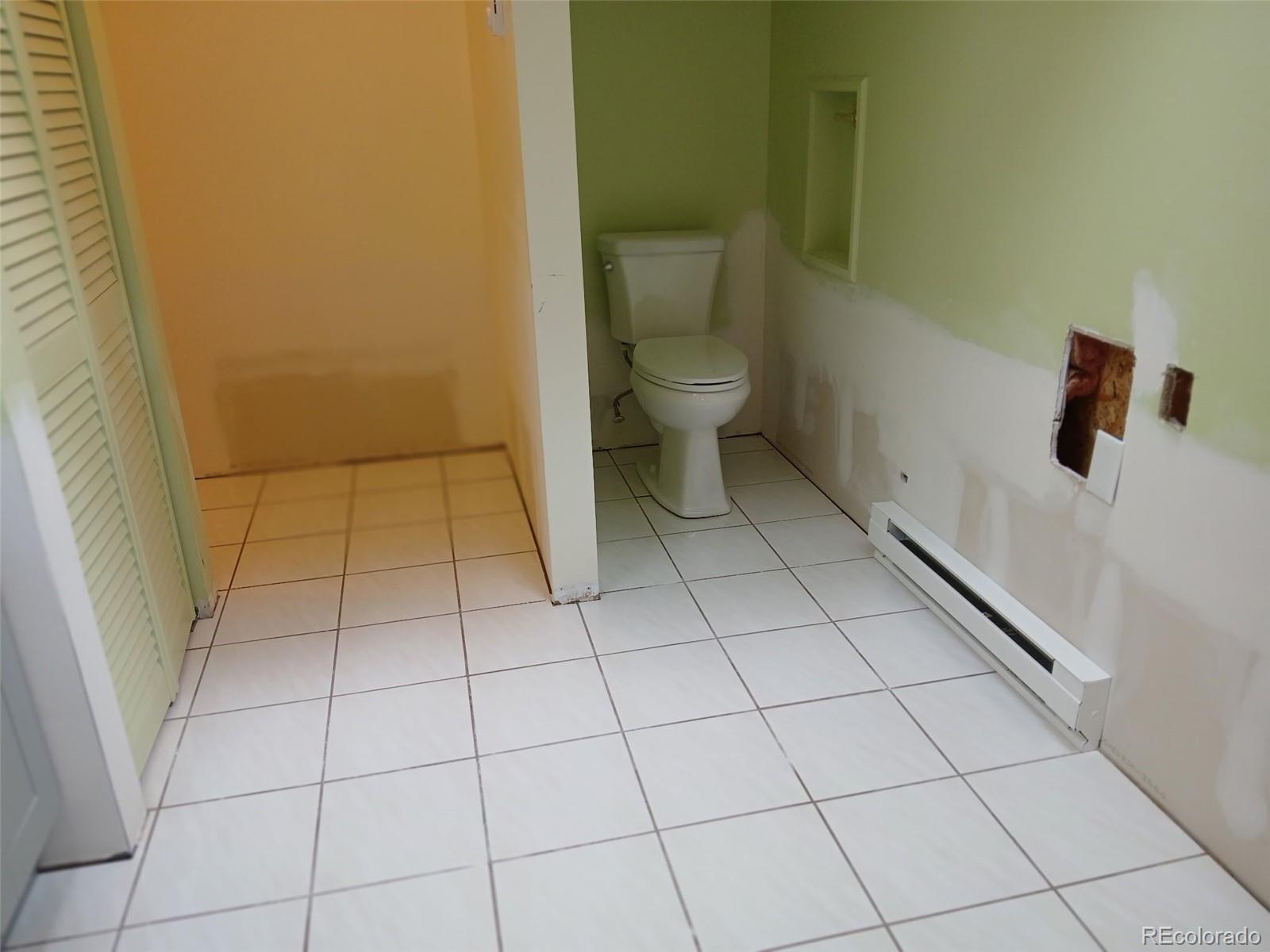 131 Hitchrack Road Bailey, CO 80421 - Photo 10 of 22 a bathroom with a toilet