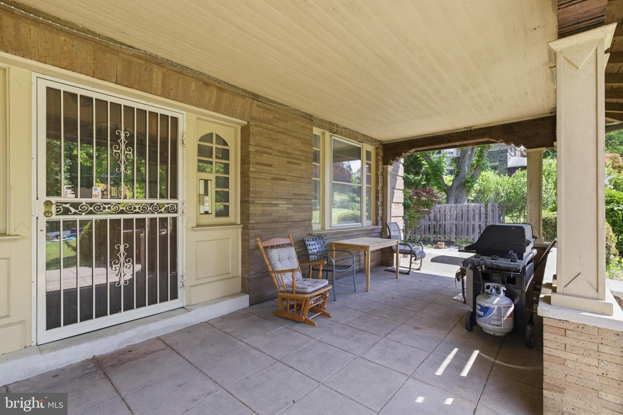 5939 Drexel Road, Unit 2 Philadelphia, PA 19131 - Photo 17 of 17 a view of a patio with a table and chairs