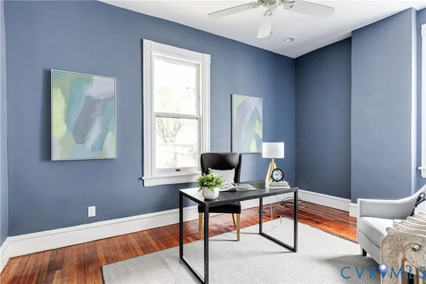 a living room with furniture and window