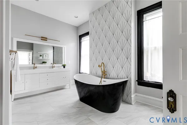 a bathroom with a sink and a bathtub