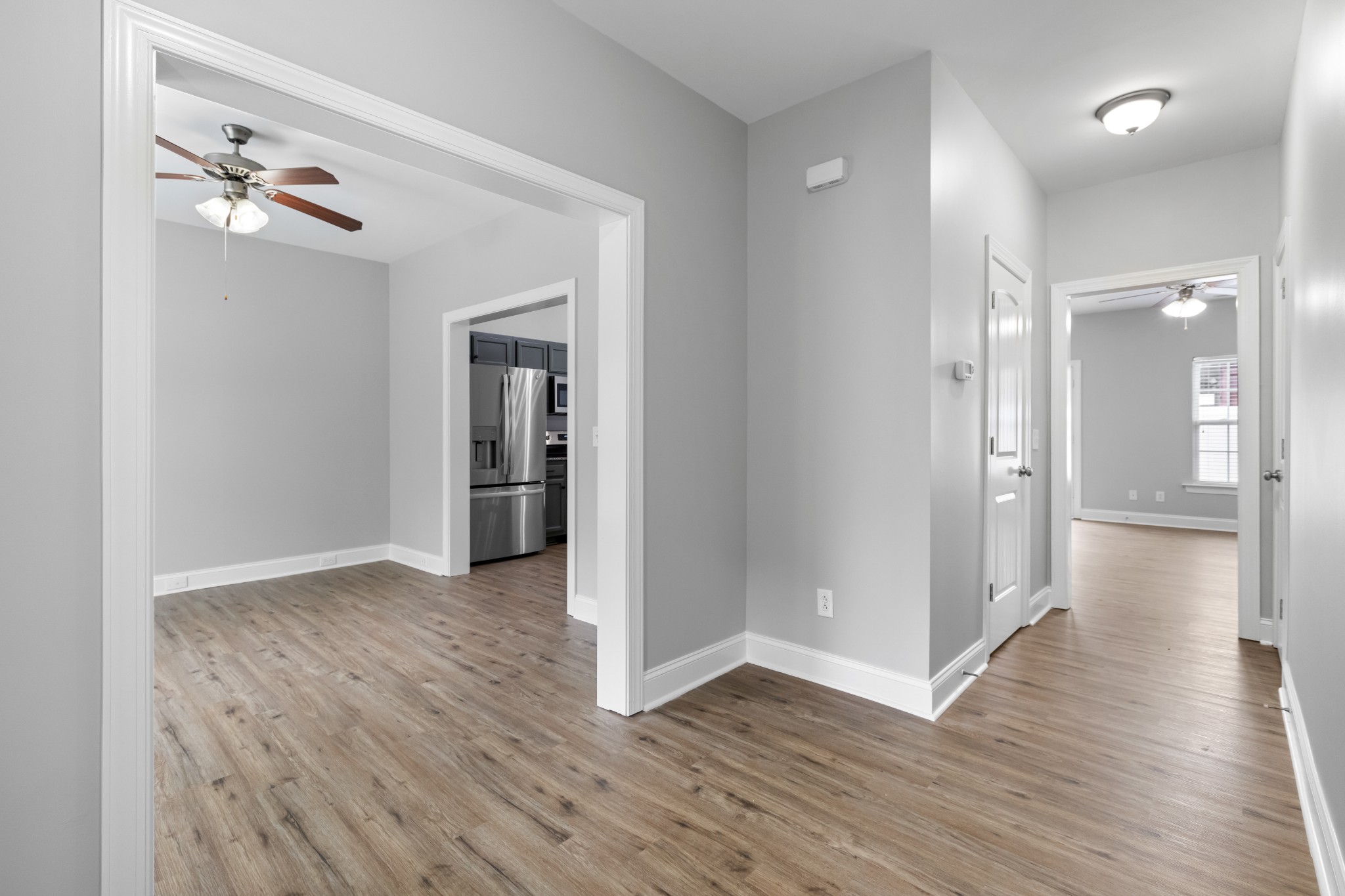 216 Rowlette Circle Murfreesboro, TN 37127 - Photo 11 of 36 a view of an empty room and wooden floor