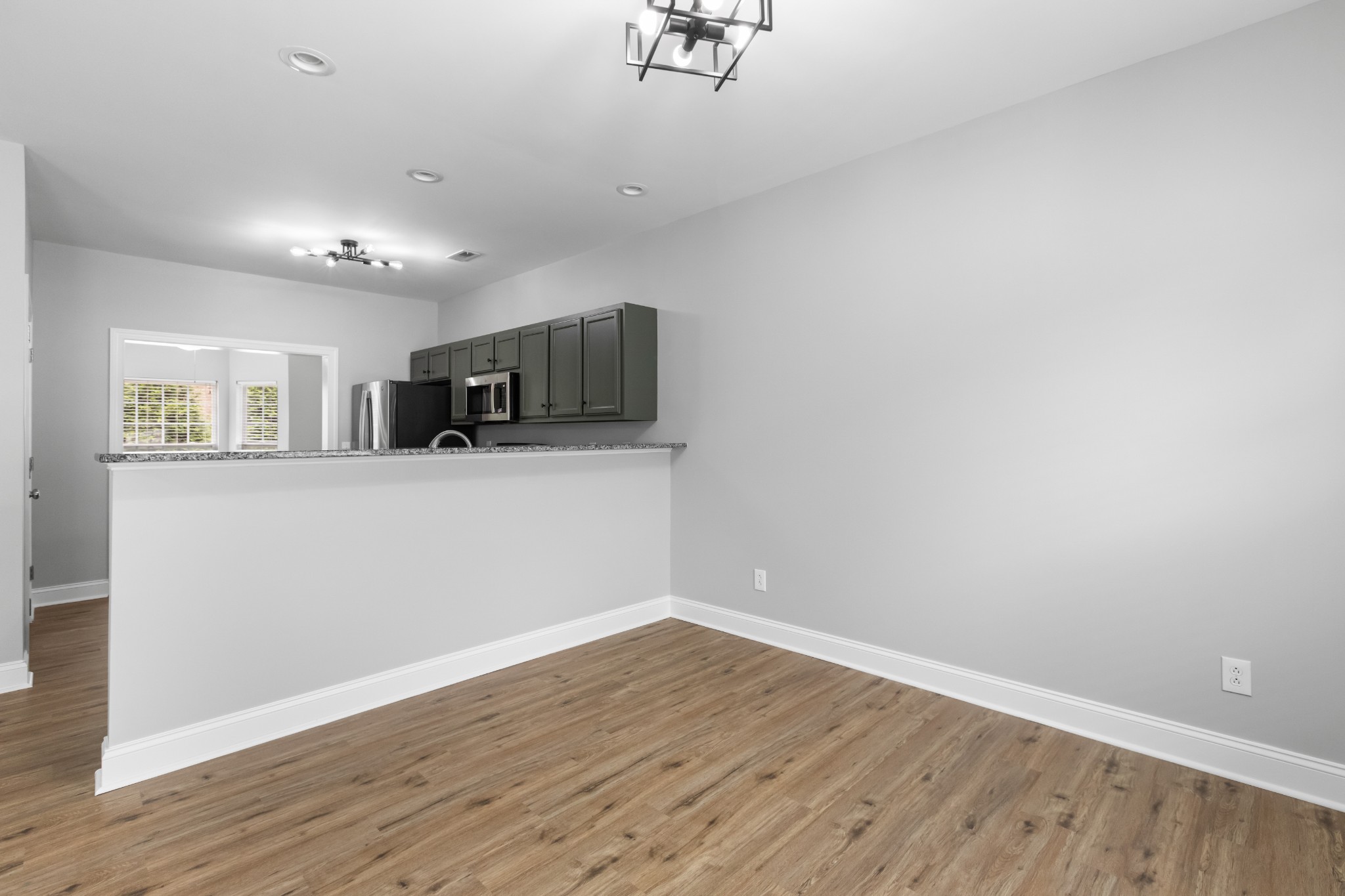 216 Rowlette Circle Murfreesboro, TN 37127 - Photo 21 of 36 a view of a kitchen with microwave and cabinets