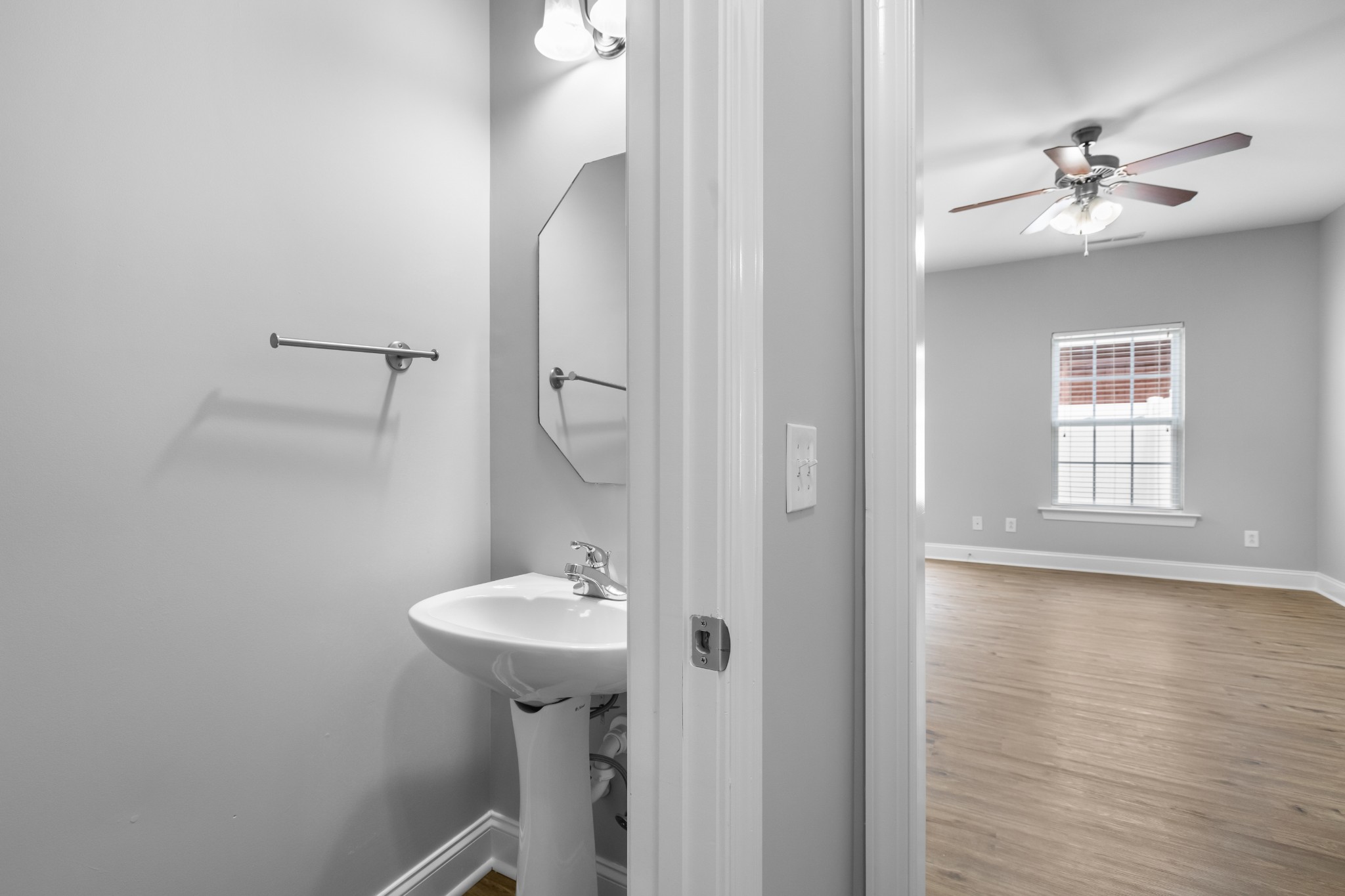 216 Rowlette Circle Murfreesboro, TN 37127 - Photo 22 of 36 a bathroom with a sink a light fixture and a mirror
