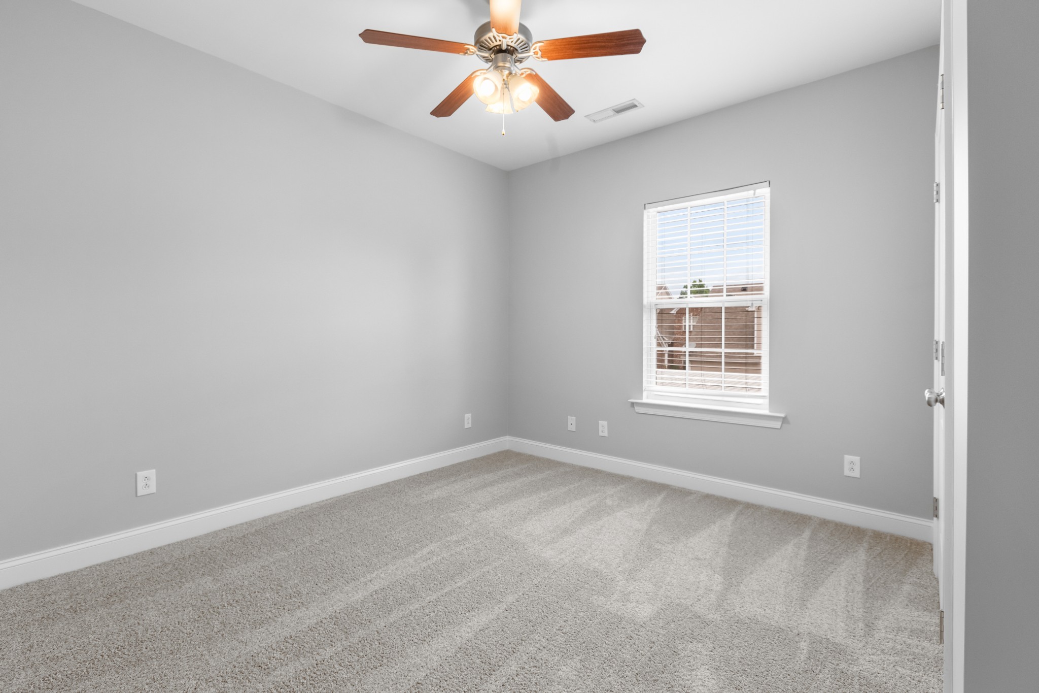 216 Rowlette Circle Murfreesboro, TN 37127 - Photo 26 of 36 an empty room with windows and fan