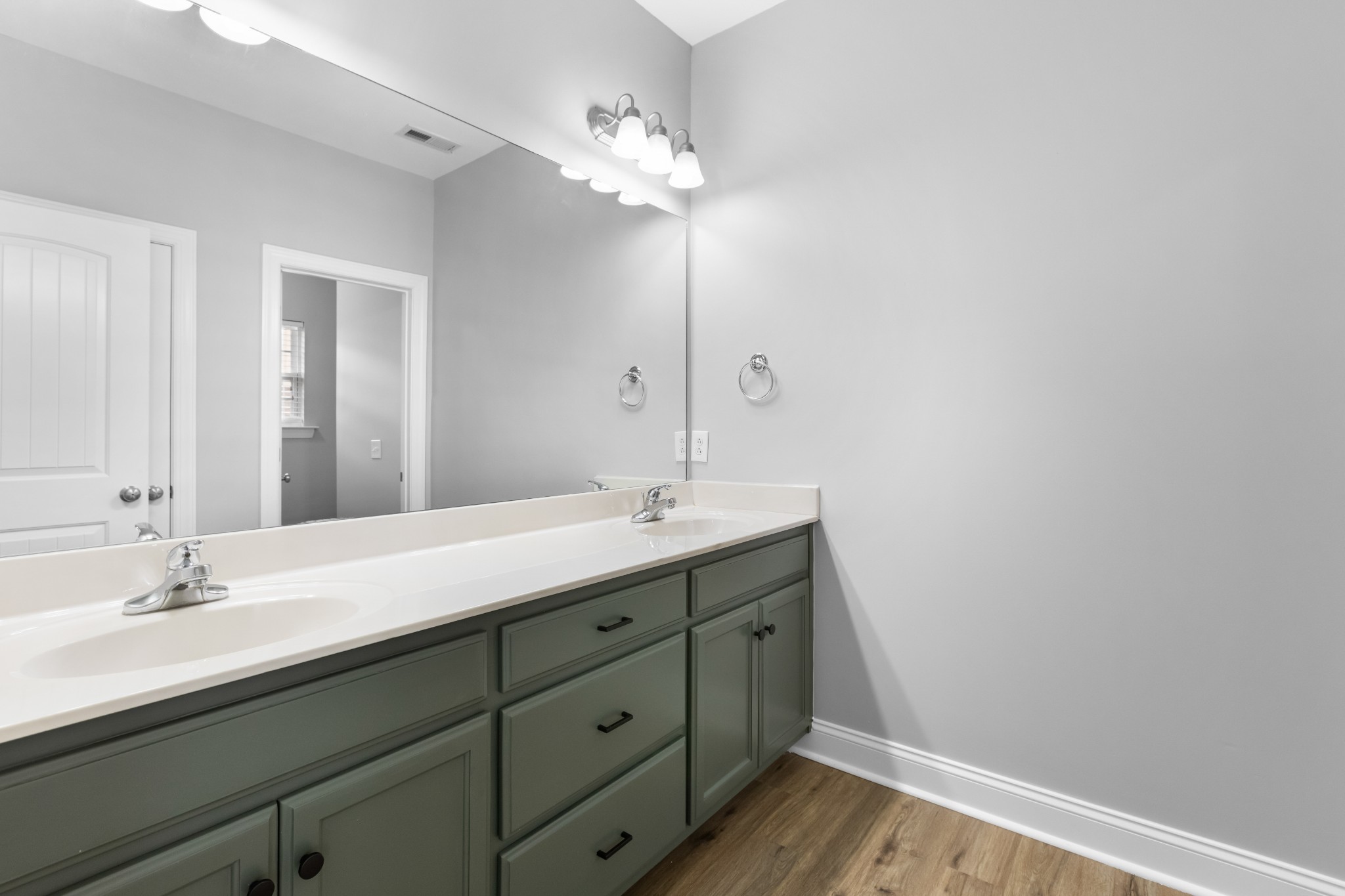 216 Rowlette Circle Murfreesboro, TN 37127 - Photo 32 of 36 a bathroom with a double vanity sink and a mirror
