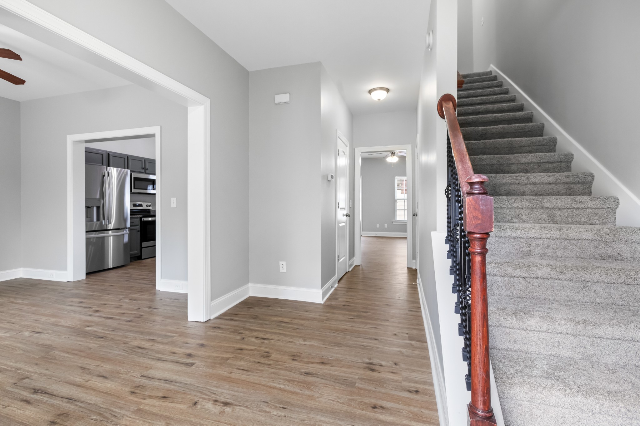 216 Rowlette Circle Murfreesboro, TN 37127 - Photo 9 of 36 a view of a hallway with wooden floor and entryway
