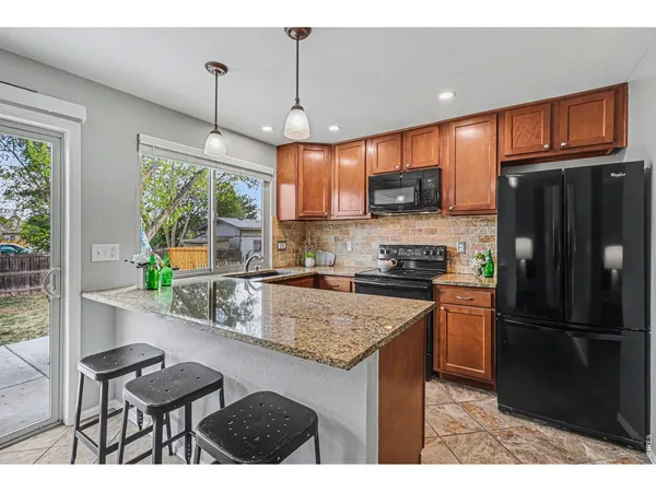 $575,000 | 11617 West 71st Drive, Arvada, CO 80004