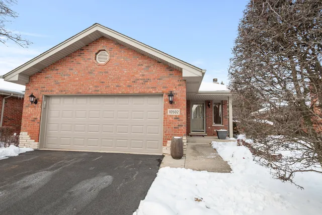 a front view of a house with yard