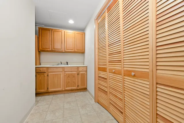 a view of a kitchen with a sink