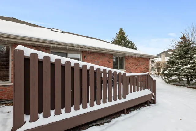 a view of a wooden fence