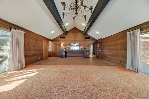 a view of a livingroom with a furniture