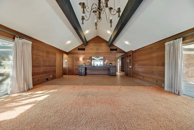 a view of a livingroom with a furniture