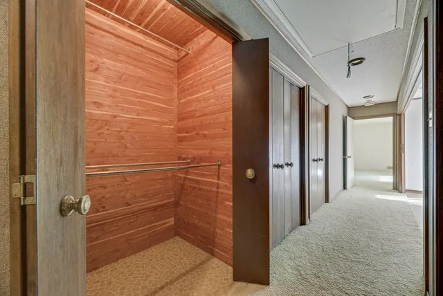 a spacious bathroom with a double vanity sink mirror and double