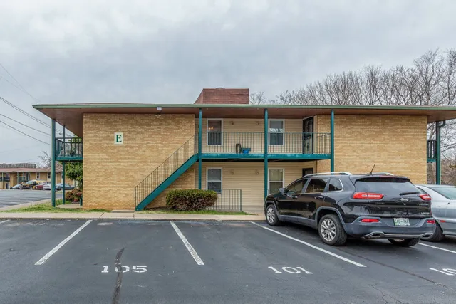 a car parked in front of a house