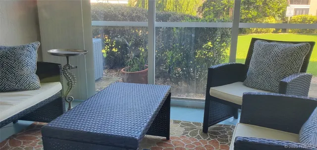 a view of a house with a garden