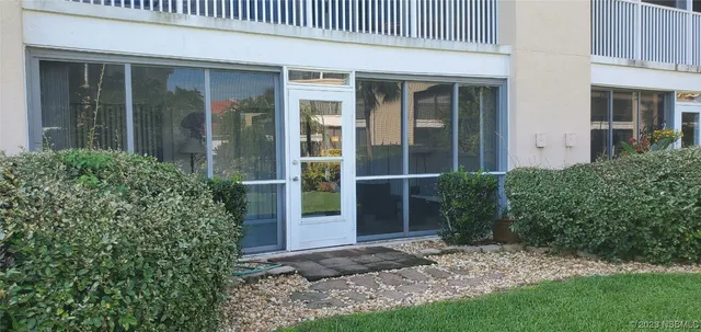 a car parked in front of a house