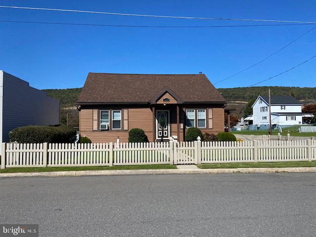 101 West Ruddle Street Coaldale, PA 18218 - Photo 2 of 26 a front view of a house with a fence