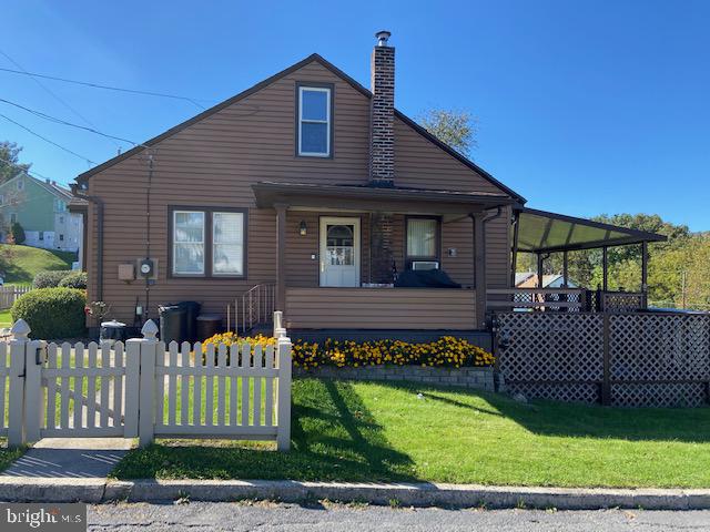101 West Ruddle Street Coaldale, PA 18218 - Photo 3 of 26 a front view of a house with a garden