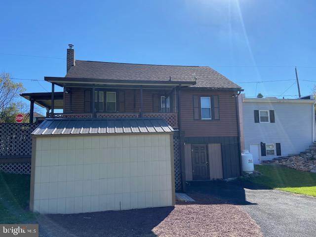 101 West Ruddle Street Coaldale, PA 18218 - Photo 4 of 26 a front view of a house with a yard