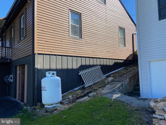 101 West Ruddle Street Coaldale, PA 18218 - Photo 5 of 26 a view of a house with backyard and sitting area