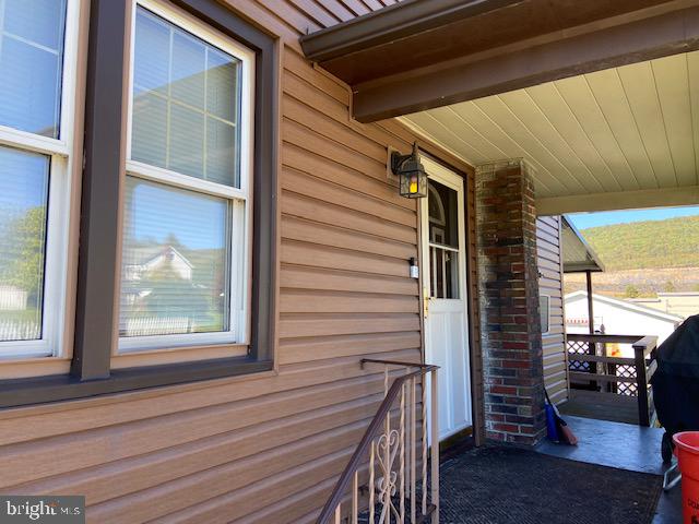 101 West Ruddle Street Coaldale, PA 18218 - Photo 6 of 26 a view of a door and chair and door