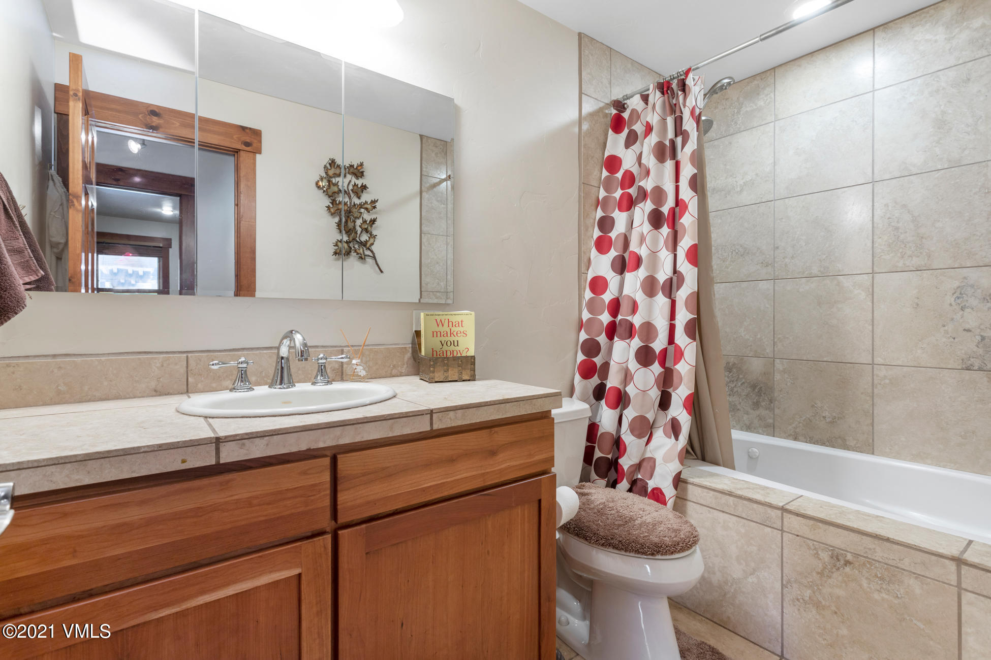 596 Daisy Lane, Unit 5 Avon, CO 81620 - Photo 12 of 23 a bathroom with a sink toilet and shower