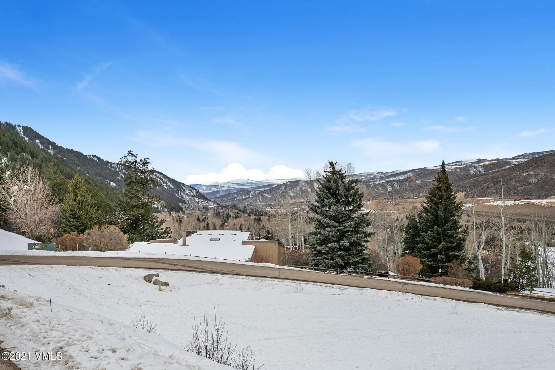 596 Daisy Lane, Unit 5 Avon, CO 81620 - Photo 22 of 23 a view of a building from a balcony