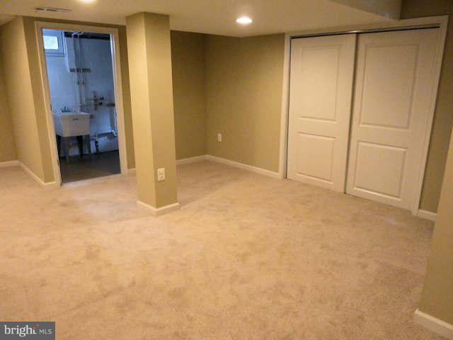 6521 Banbury Road Baltimore, MD 21239 - Photo 19 of 29 a view of a room with a wardrobe space