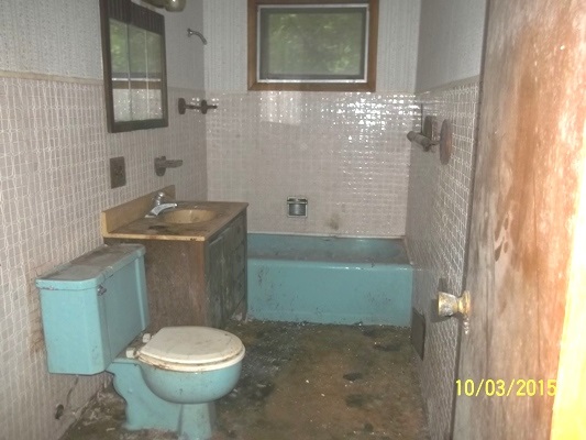 6195 State Line Road South Beloit, IL 61080 - Photo 8 of 11 a bathroom with a sink toilet and shower
