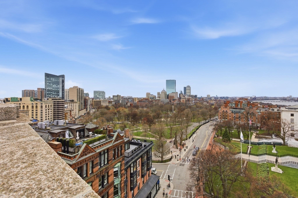21 Beacon Street, Unit 11L Boston, MA 02108 - Photo 16 of 23 a view of a city skyline from a terrace