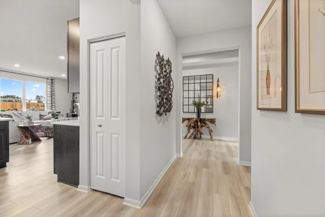 a view of a living room and dining room