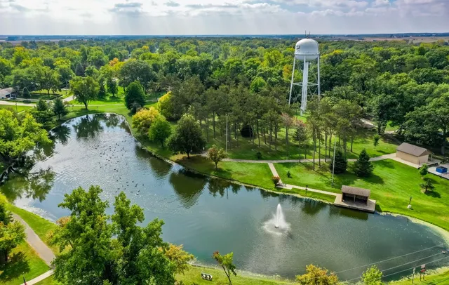 a view of a lake with a yard