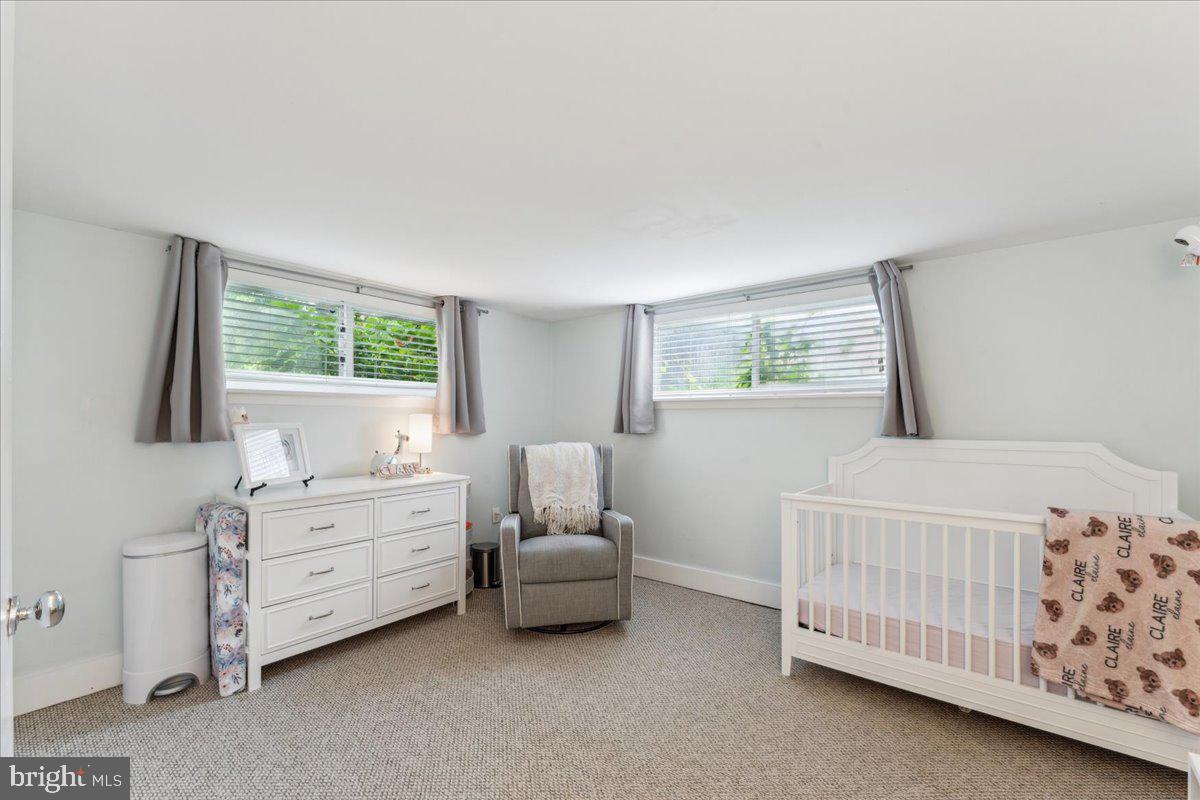 5222 Ferndale Street Springfield, VA 22151 - Photo 20 of 33 a bedroom with furniture and window
