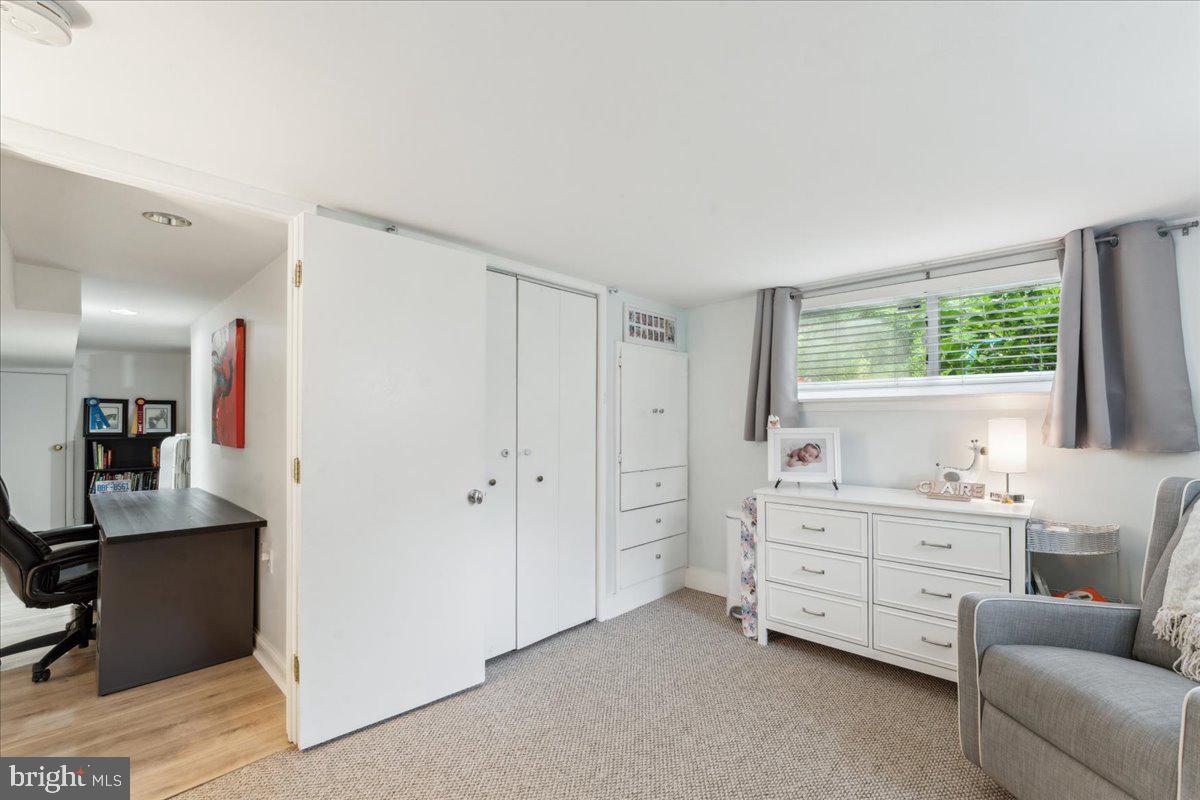 5222 Ferndale Street Springfield, VA 22151 - Photo 21 of 33 a room that has a dresser and a window in it