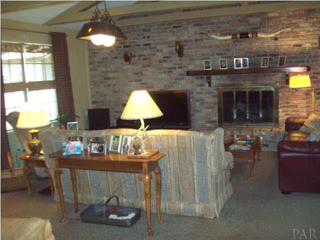 3960 Croydon Road Pensacola, FL 32514 - Photo 9 of 25 Family room with wood burning fireplace