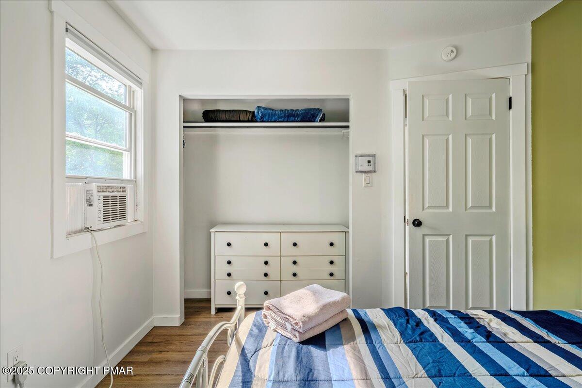 2102 Woodland Court Pocono Summit, PA 18346 - Photo 28 of 42 a bedroom with a bed and a window