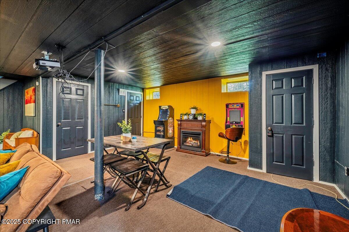 2102 Woodland Court Pocono Summit, PA 18346 - Photo 34 of 42 a view of a livingroom with furniture and wooden floor