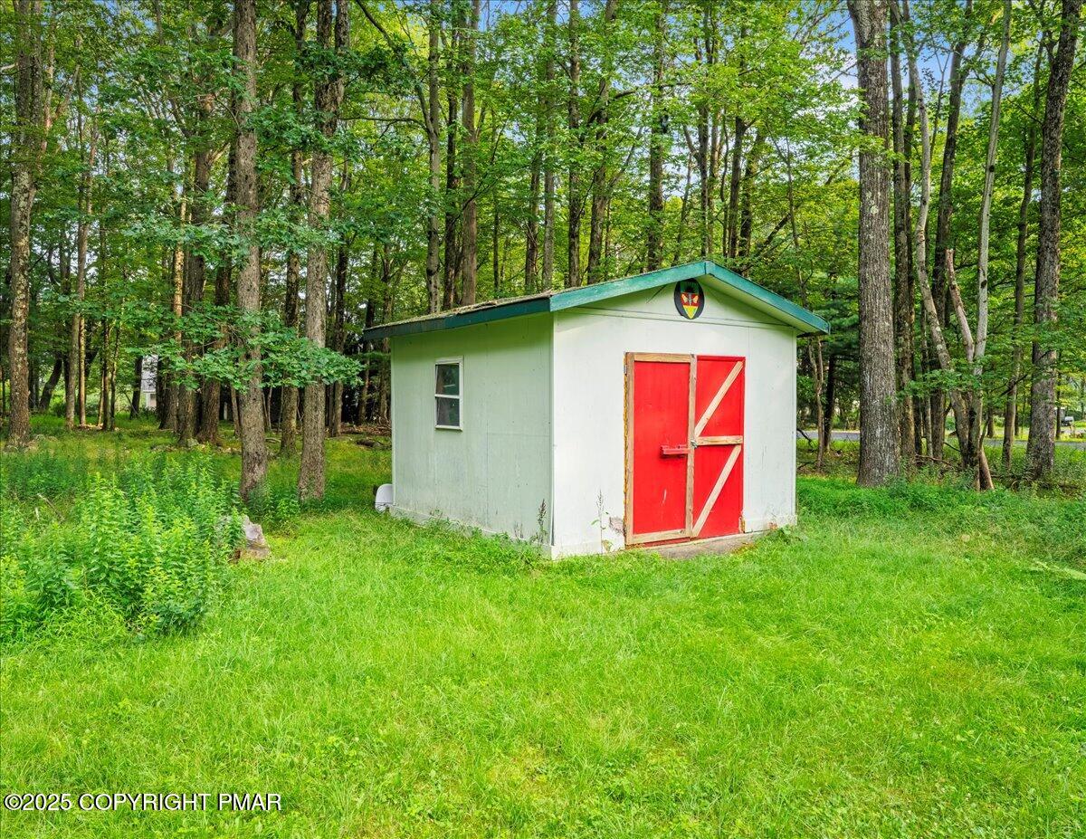 2102 Woodland Court Pocono Summit, PA 18346 - Photo 38 of 42 a view of a back yard with green space