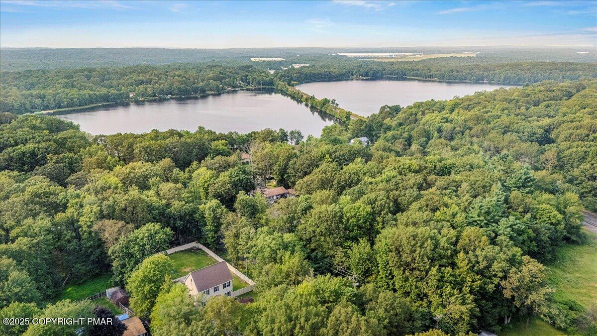 2102 Woodland Court Pocono Summit, PA 18346 - Photo 41 of 42 an aerial view of residential houses with outdoor space and lake view
