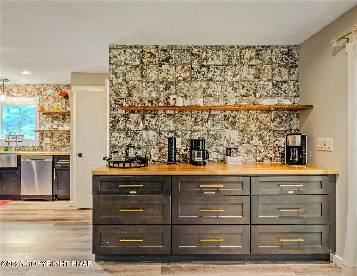 2102 Woodland Court Pocono Summit, PA 18346 - Photo 6 of 42 a view of room with window and cabinet