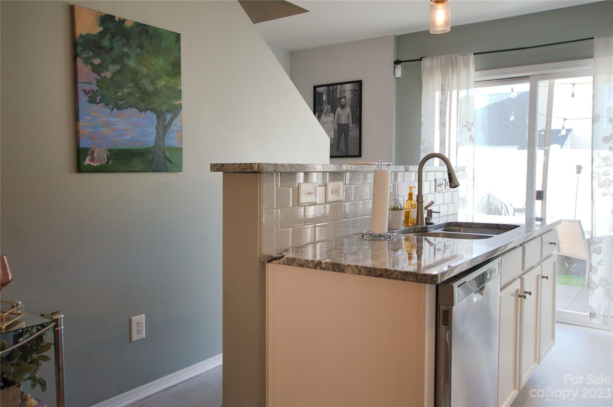 303 River Clay Road, Unit 135 Fort Mill, SC 29708 - Photo 10 of 19 a kitchen with a sink and a refrigerator
