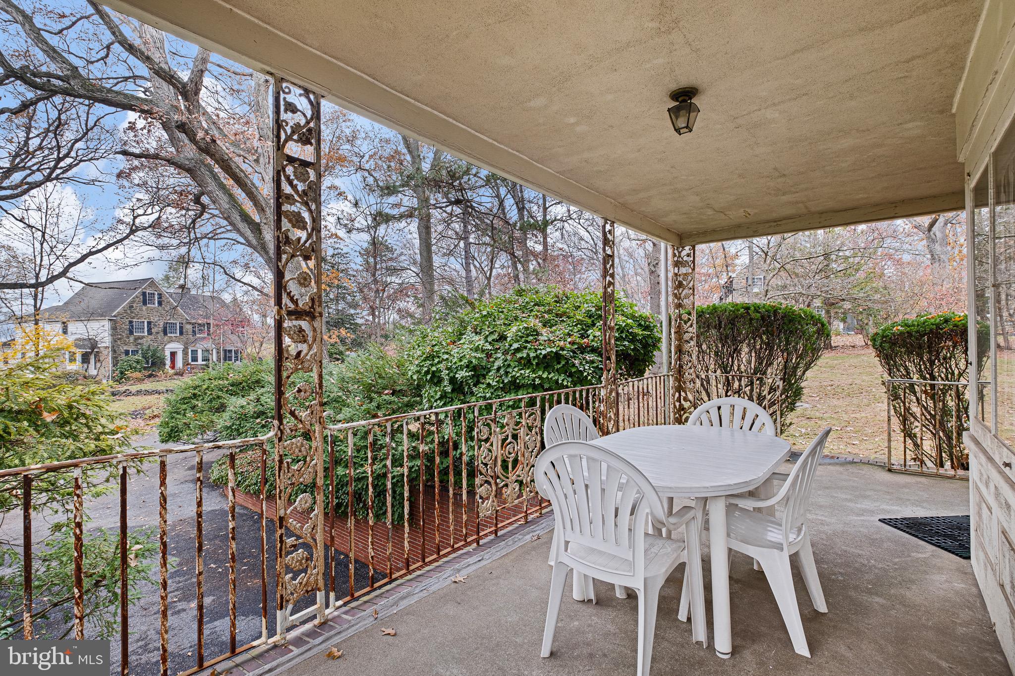 5 Blue Rock Road Wilmington, DE 19809 - Photo 18 of 42 a view of a patio with a table and chairs