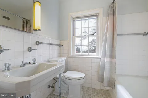 a view of a house with a street