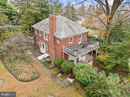an aerial view of residential house with outdoor space